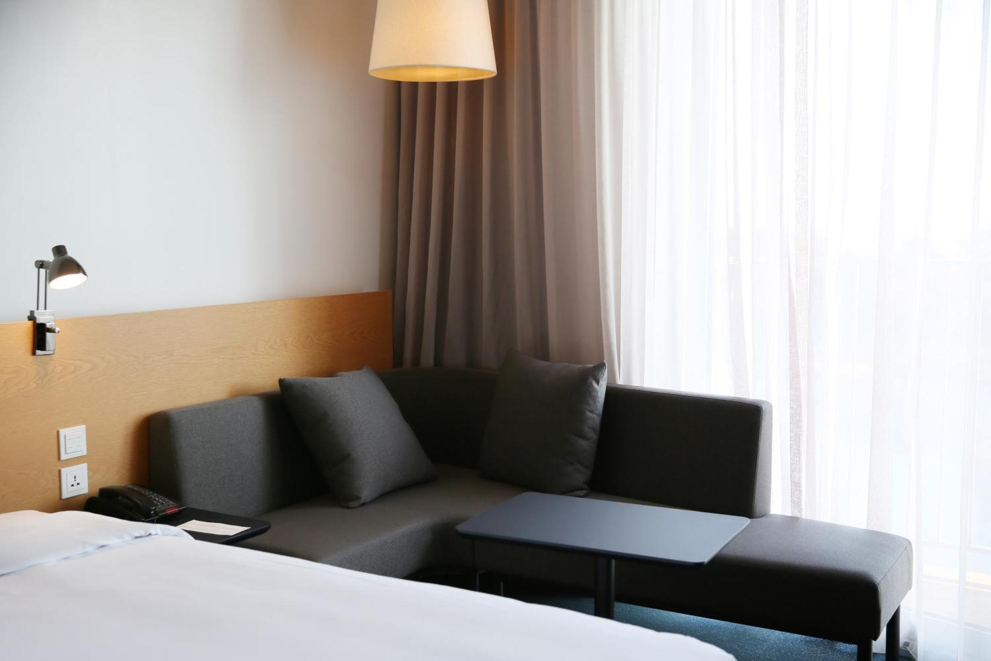 Nest Hotel Inčchon Exteriér fotografie A sofa bed